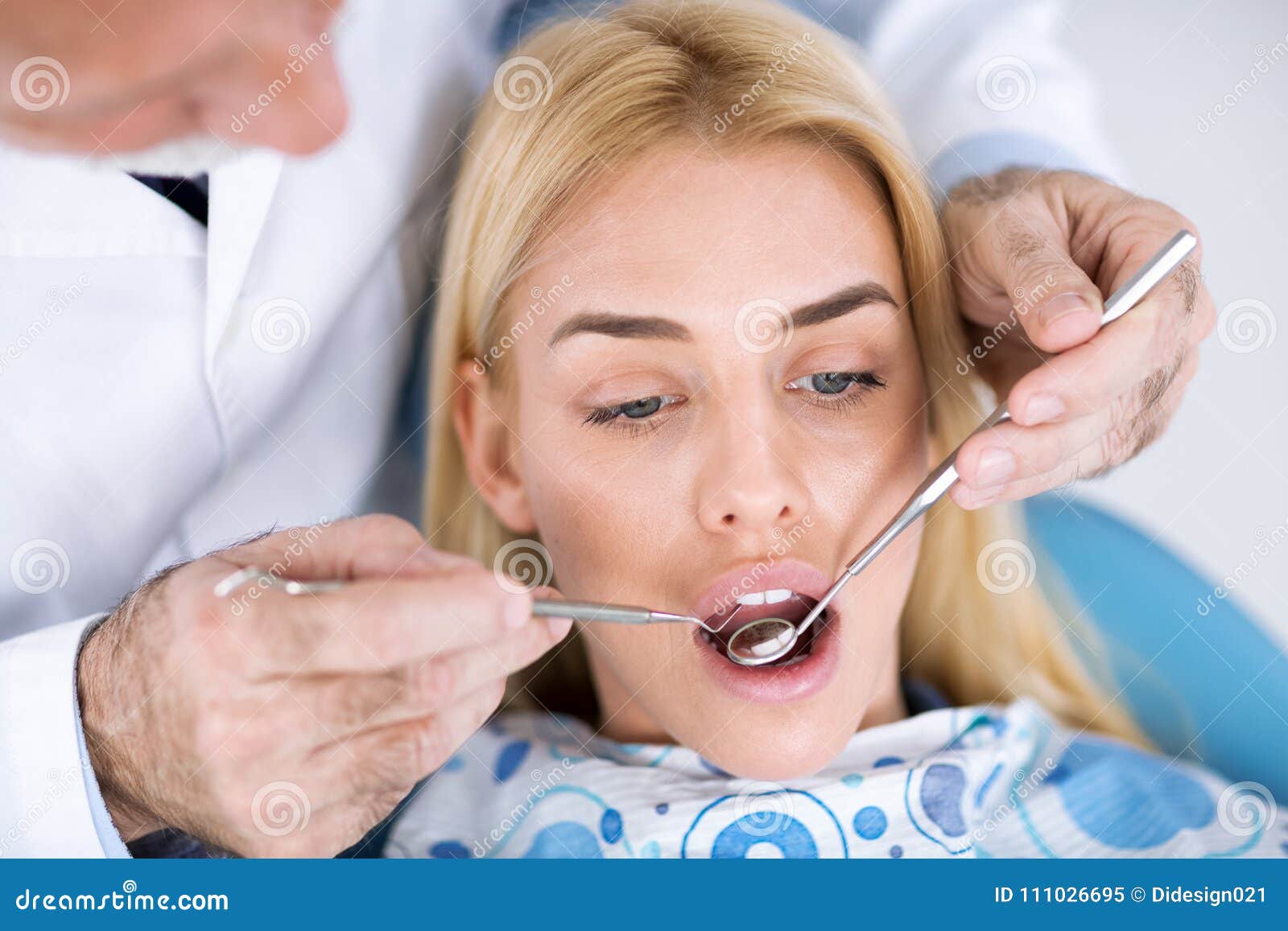 Dentist Examining a Patient`s Teeth in the Dentist Stock Image Image of patient, mouth 111026695