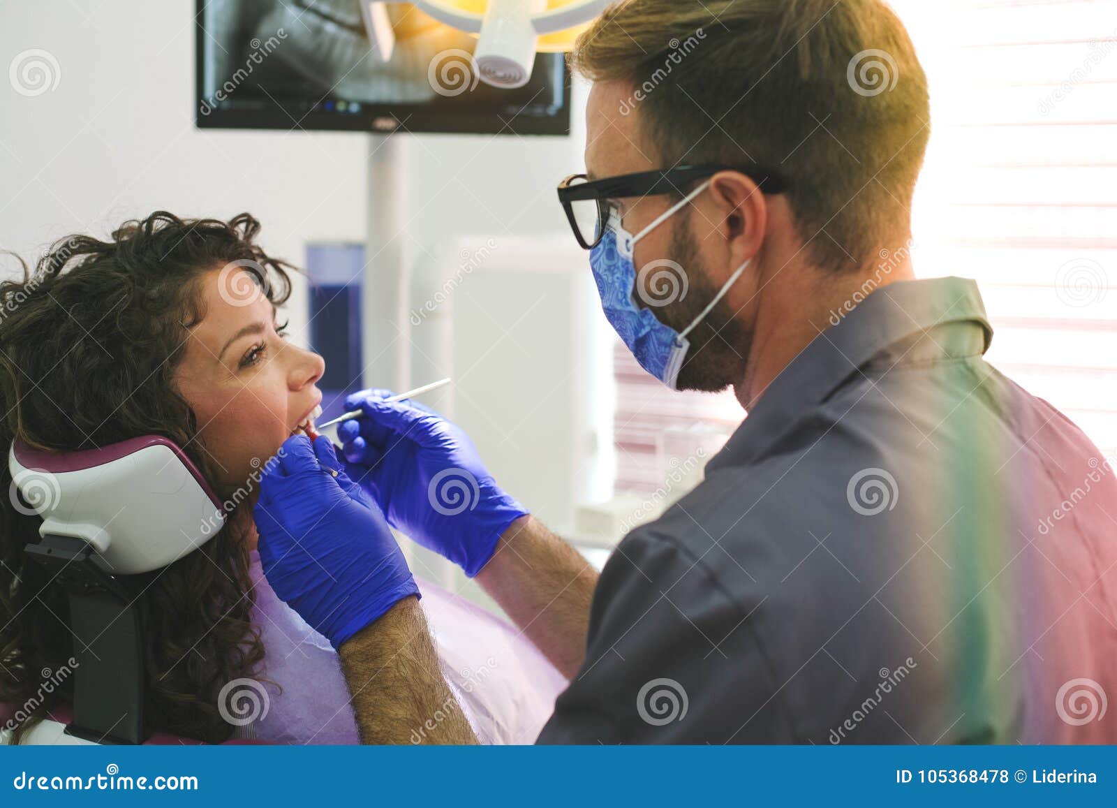 Dentist Examining Patient S Teeth Male Dentist Stock Photo Image Of