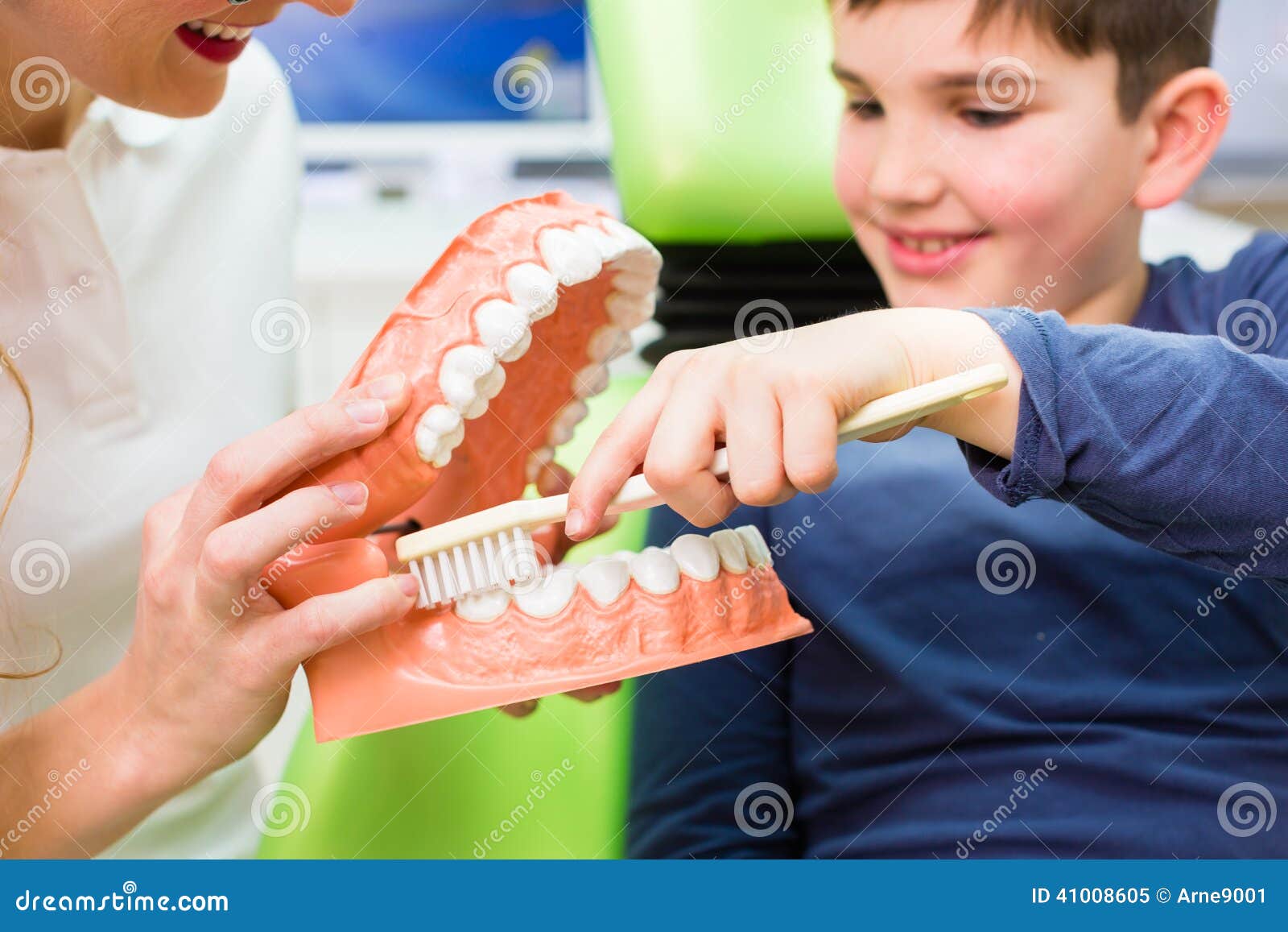 Dentist Explaining Boy Cleaning Tooth Stock Image Image of showing