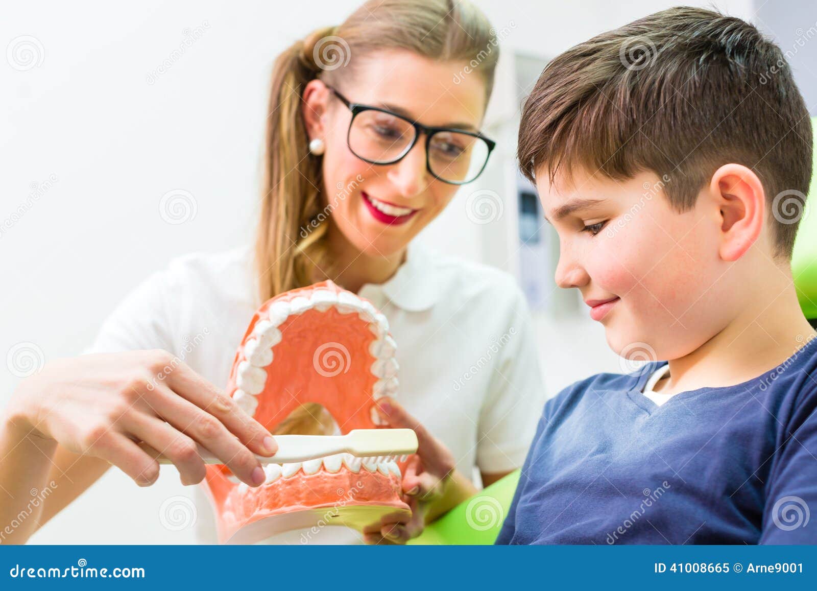 Dentist Explaining Boy Cleaning Tooth Stock Image Image of dental