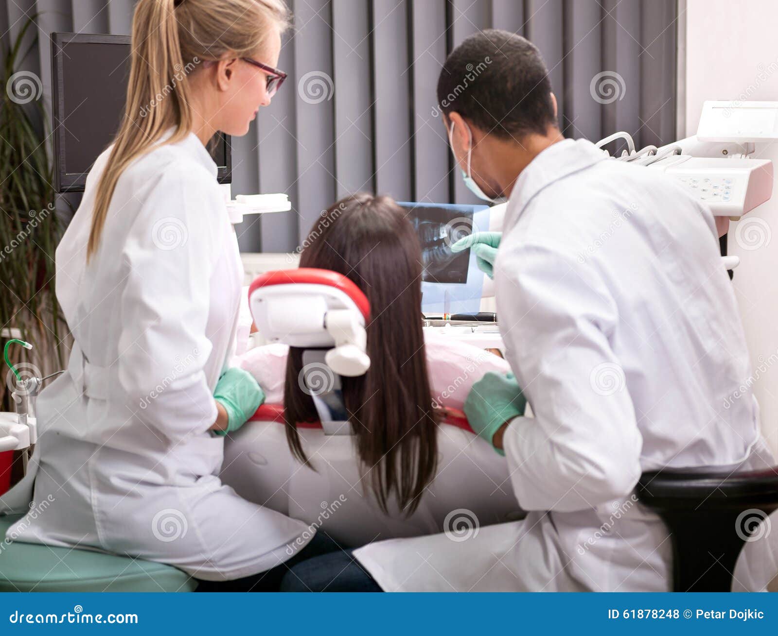 Dentist Explaining The Details Of Xray Picture To His