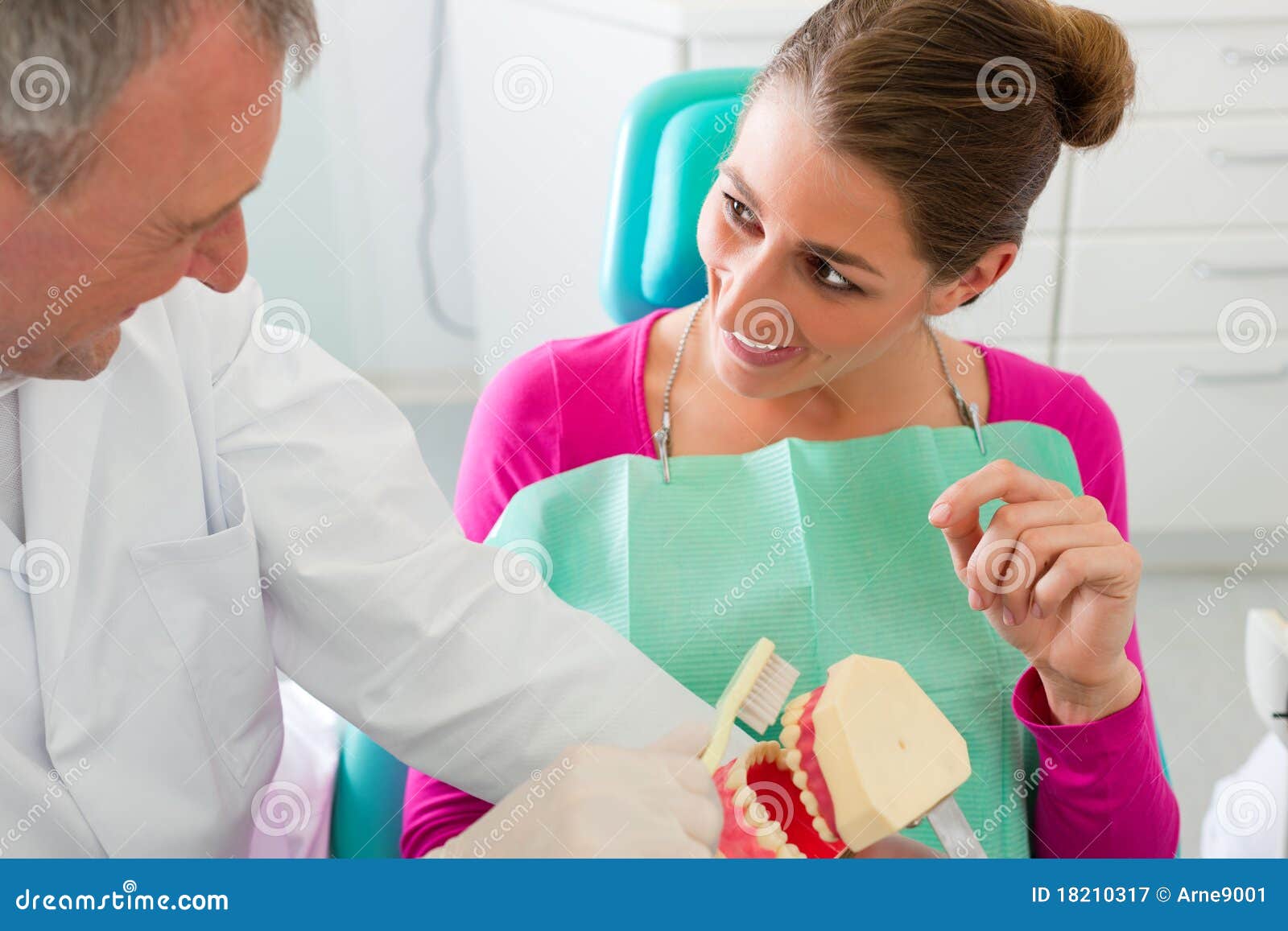 Dentist Explaining Teeth Brushing To Patient Stock Image Image of