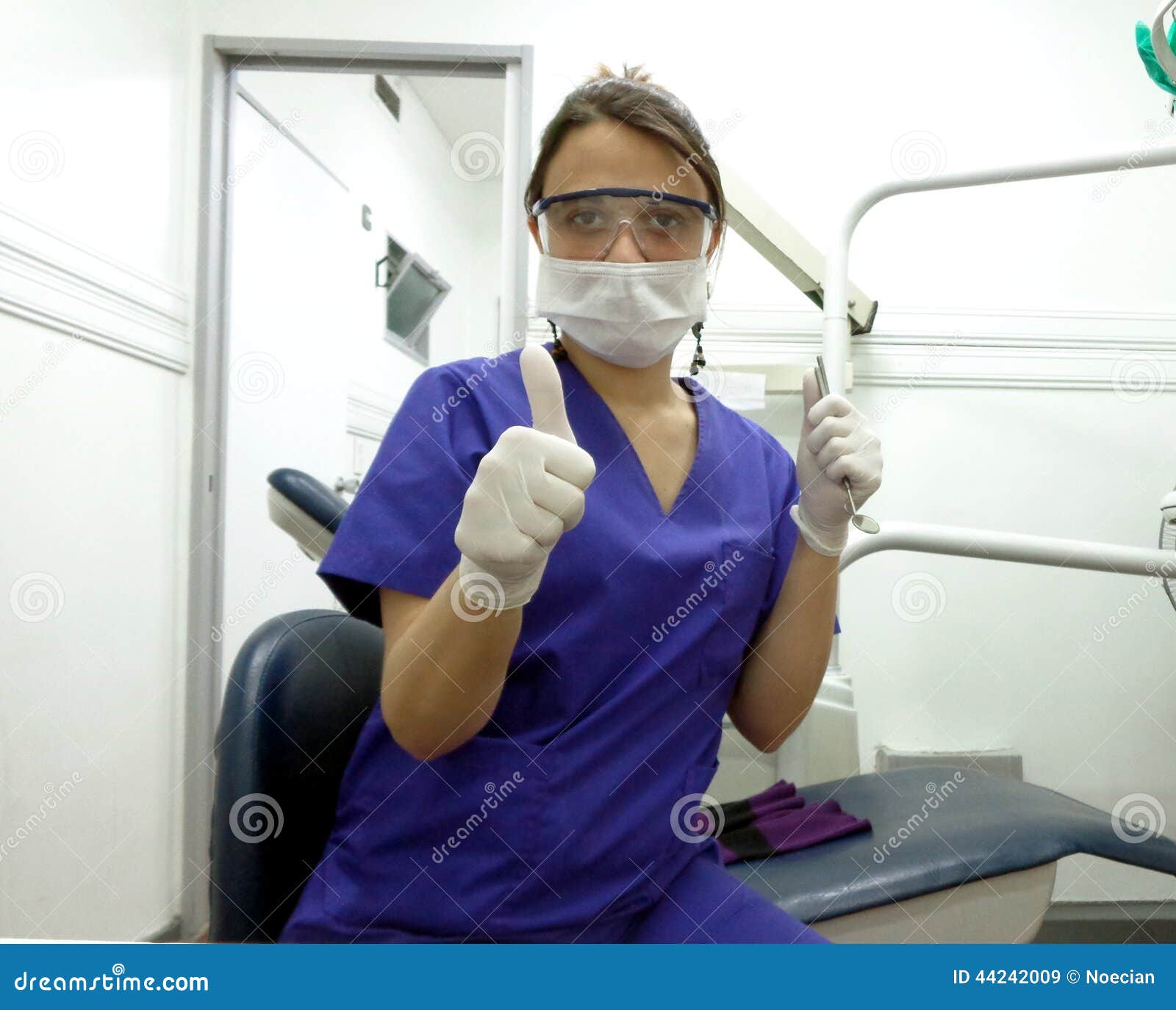 Dentist with Gloves, Mask, Mirror and Explorer Stock Image Image of