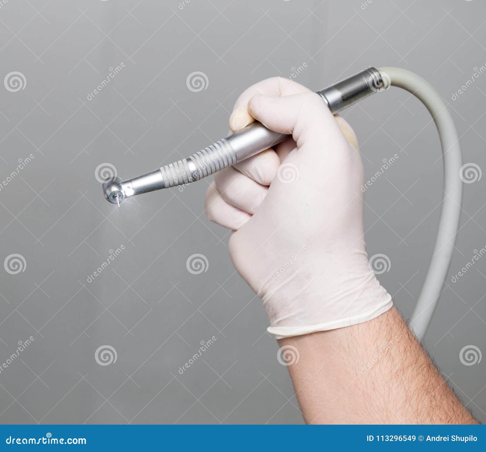 The Dentist Holds a Tool in His Hand Stock Image Image of dentistry
