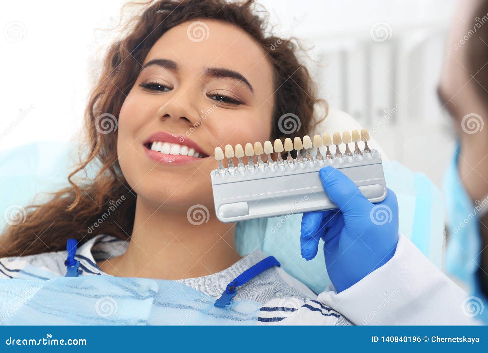 Dentist Matching Patient`s Teeth Color with Palette Stock Photo Image