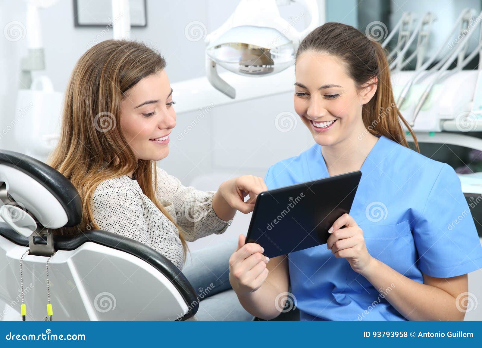 dentist and patient choosing treatment