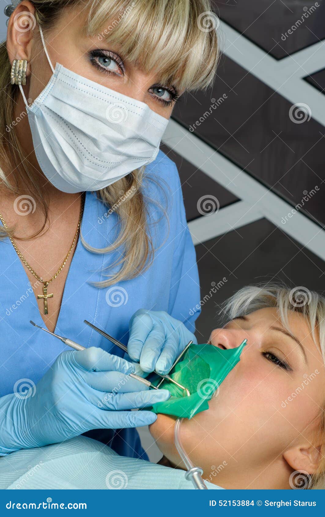 Dentist with Patient, Cleaning and Curing Stock Photo Image of clinic