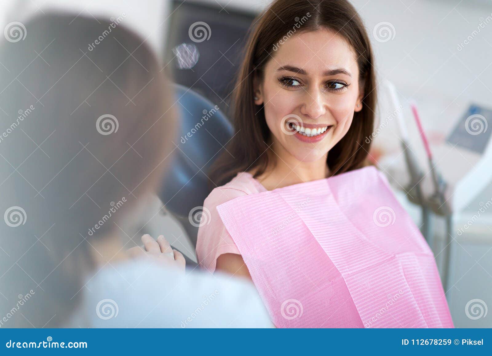 dentist and patient in dentist office