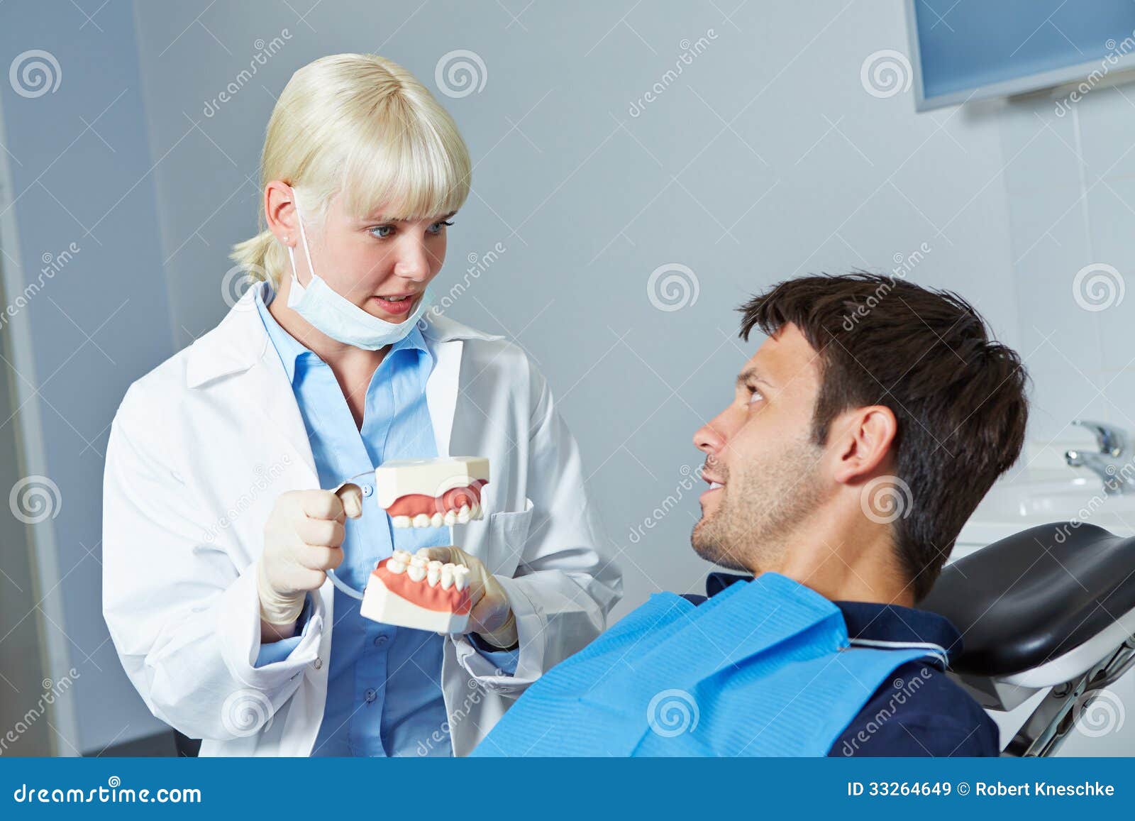 Dentist Showing Denture To Patient Stock Image Image of orthodontics