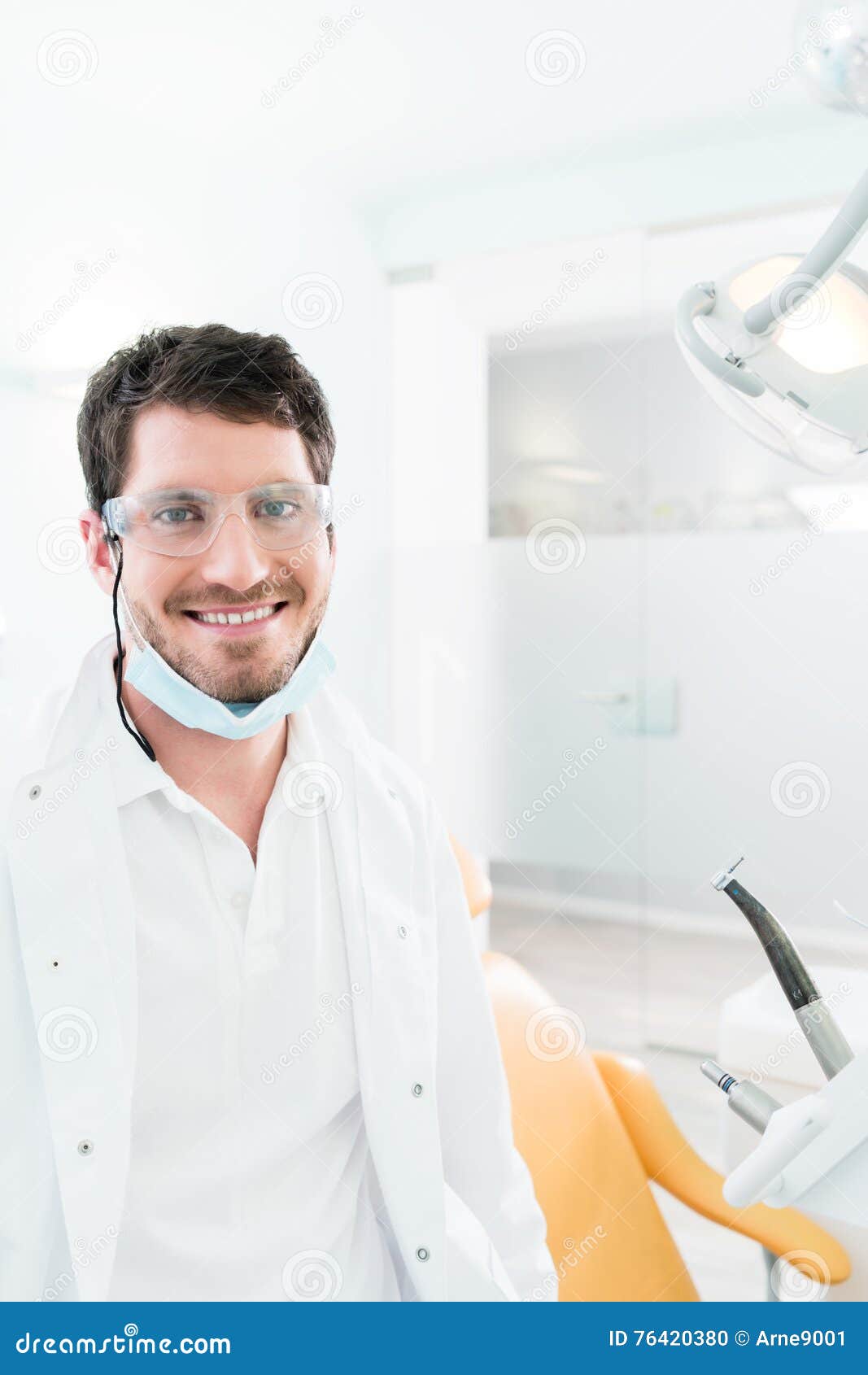Dentist Standing in Dental Surgery Stock Photo Image of dentist