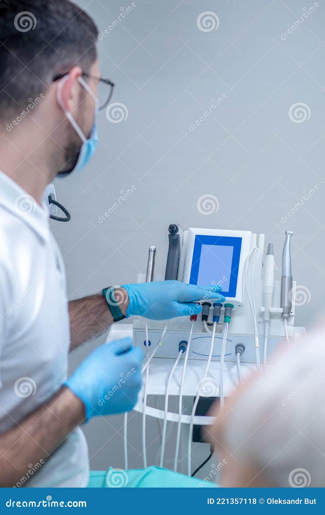 Dentist in Sterile Gloves Working with a Patient in His Office Stock Photo Image of lifestyle
