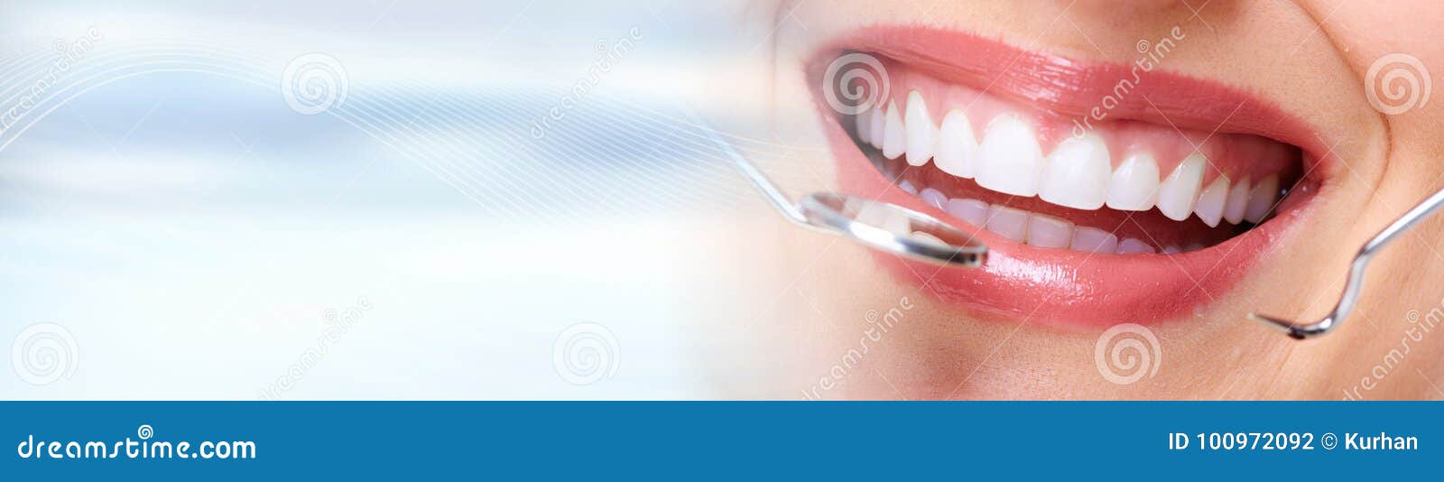woman teeth with dental instruments