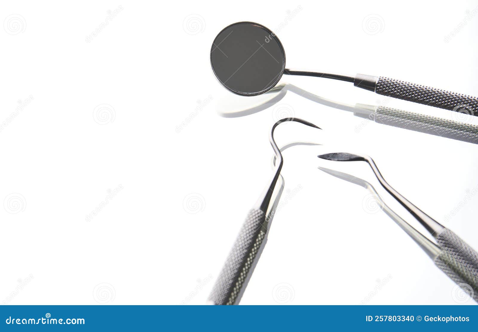 Dentist Tools on White Background with Copy Space, Closeup Stock Photo