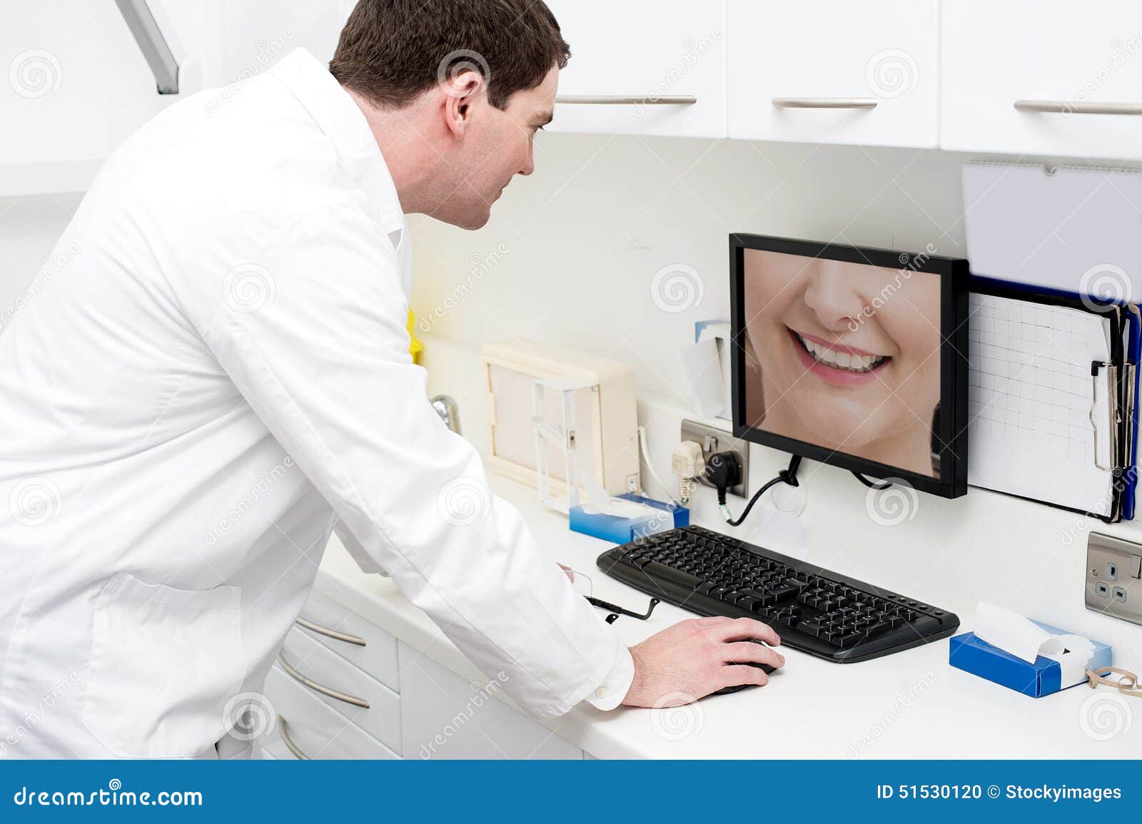 Dentist Using Computer in Dental Clinic Stock Photo Image of