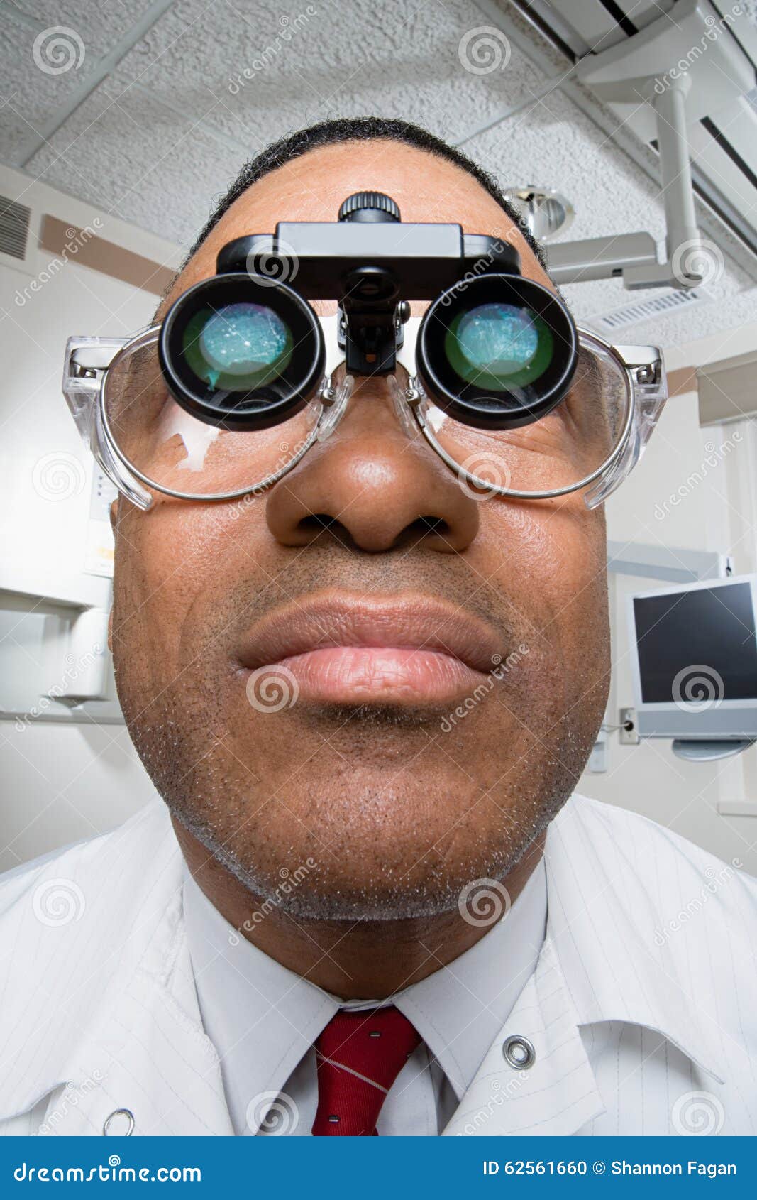 Dentist Wearing Dental Binocular Loupes Stock Photo Image of coat