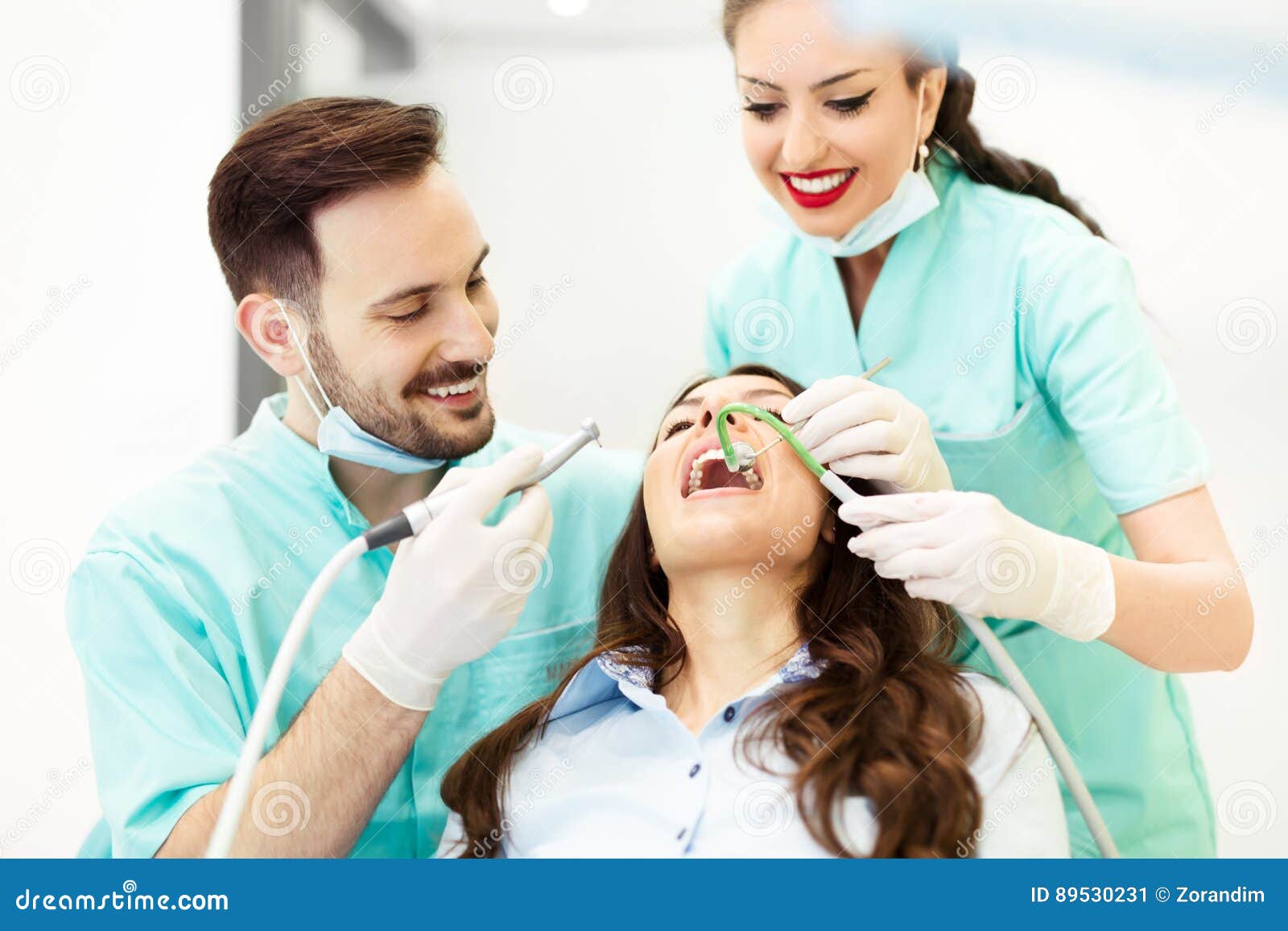 Dentist at Work. Young Female Patient Visiting Dentist Office Stock