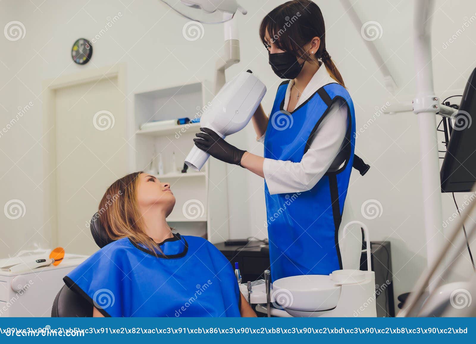 Dentist Working with Dental Polymerization Lamp in Oral Cavity. Stock Photo Image of doctor