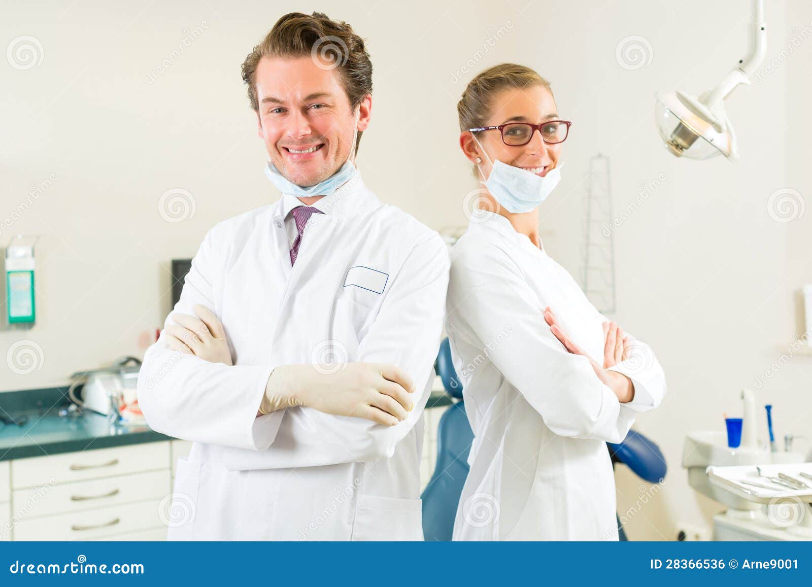 Dentists in their surgery stock photo. Image of team 28366536