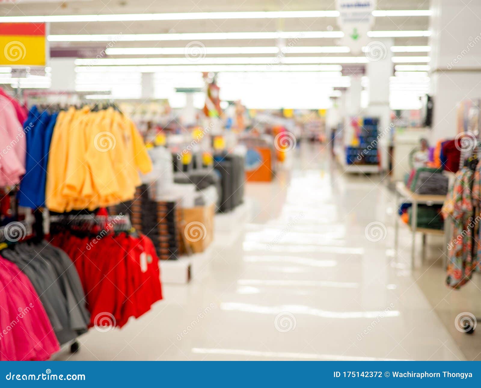 department of clothing sales in supermarkets, blurred shopping mall and retails store interior for background.