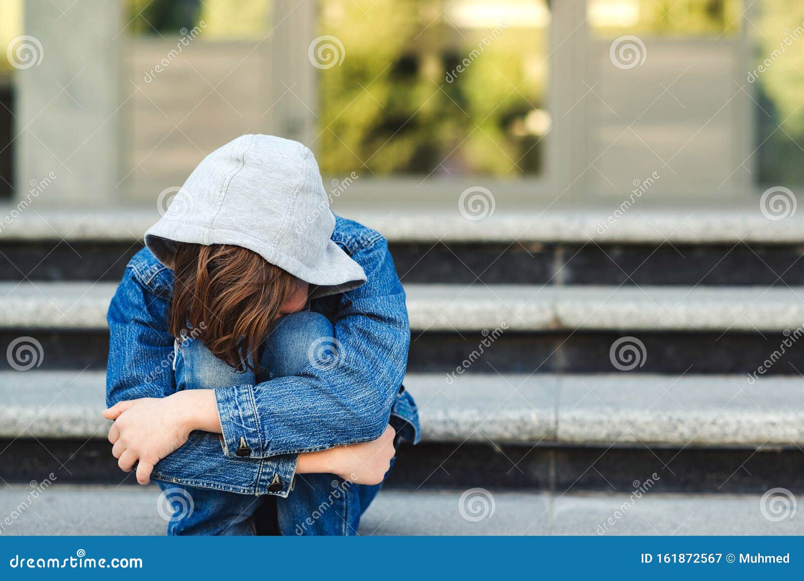 Depressed Boy Sitting Alone with Sad Feeling Outside School ...
