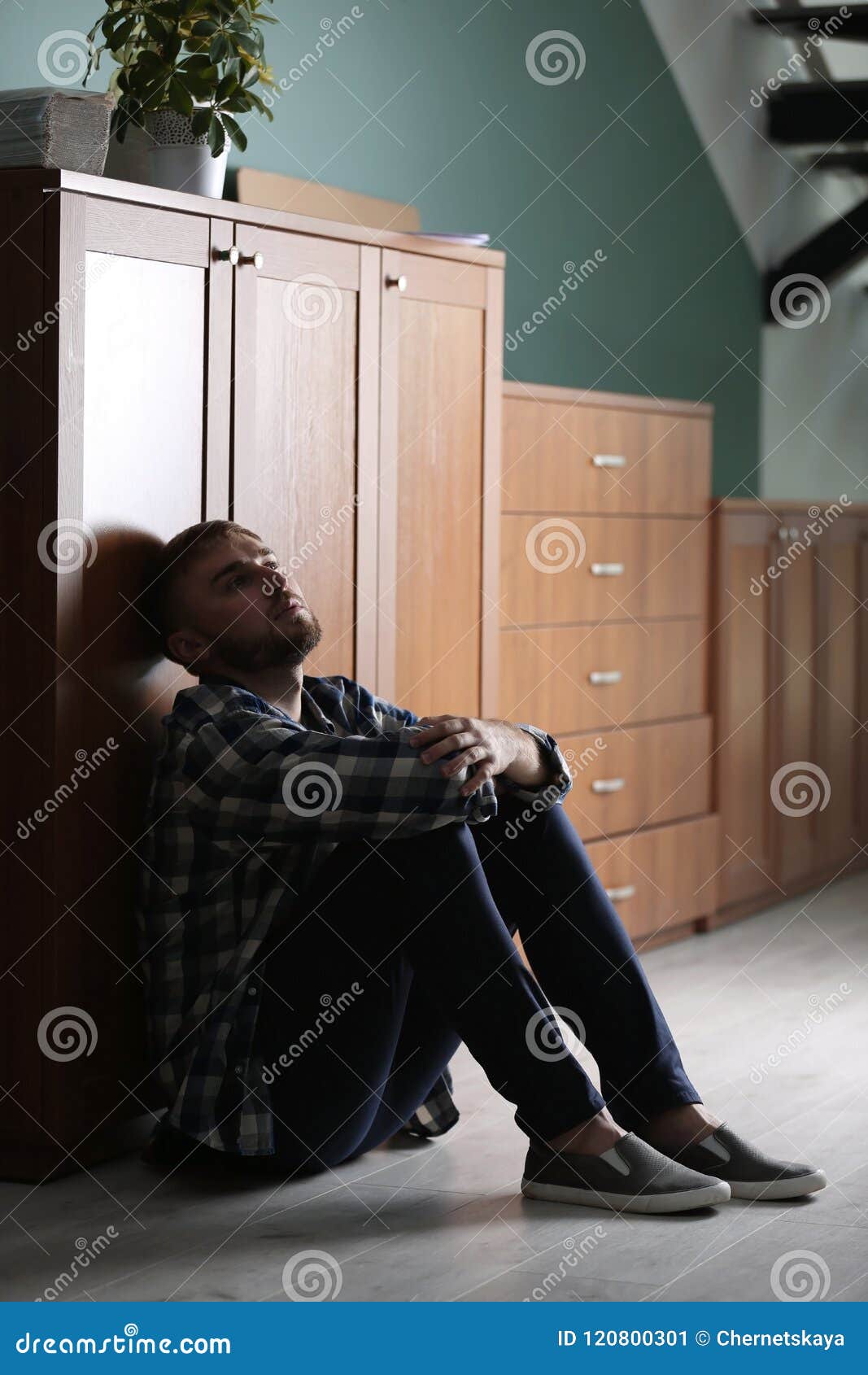 Depressed Young Man Sitting on Floor Stock Image - Image of indoors ...