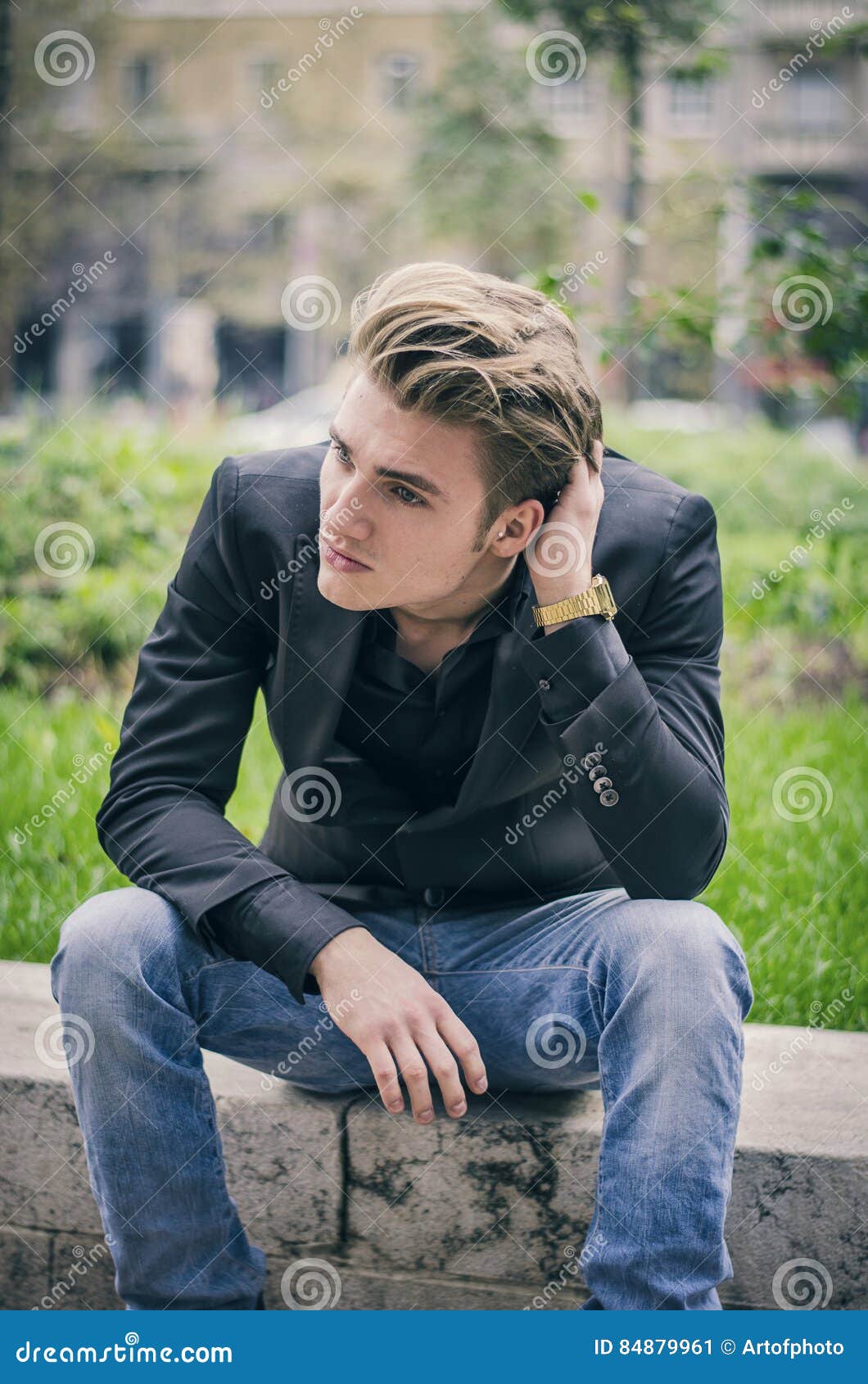 Depressed Young White Man Sitting at Street Side Stock Image - Image of ...