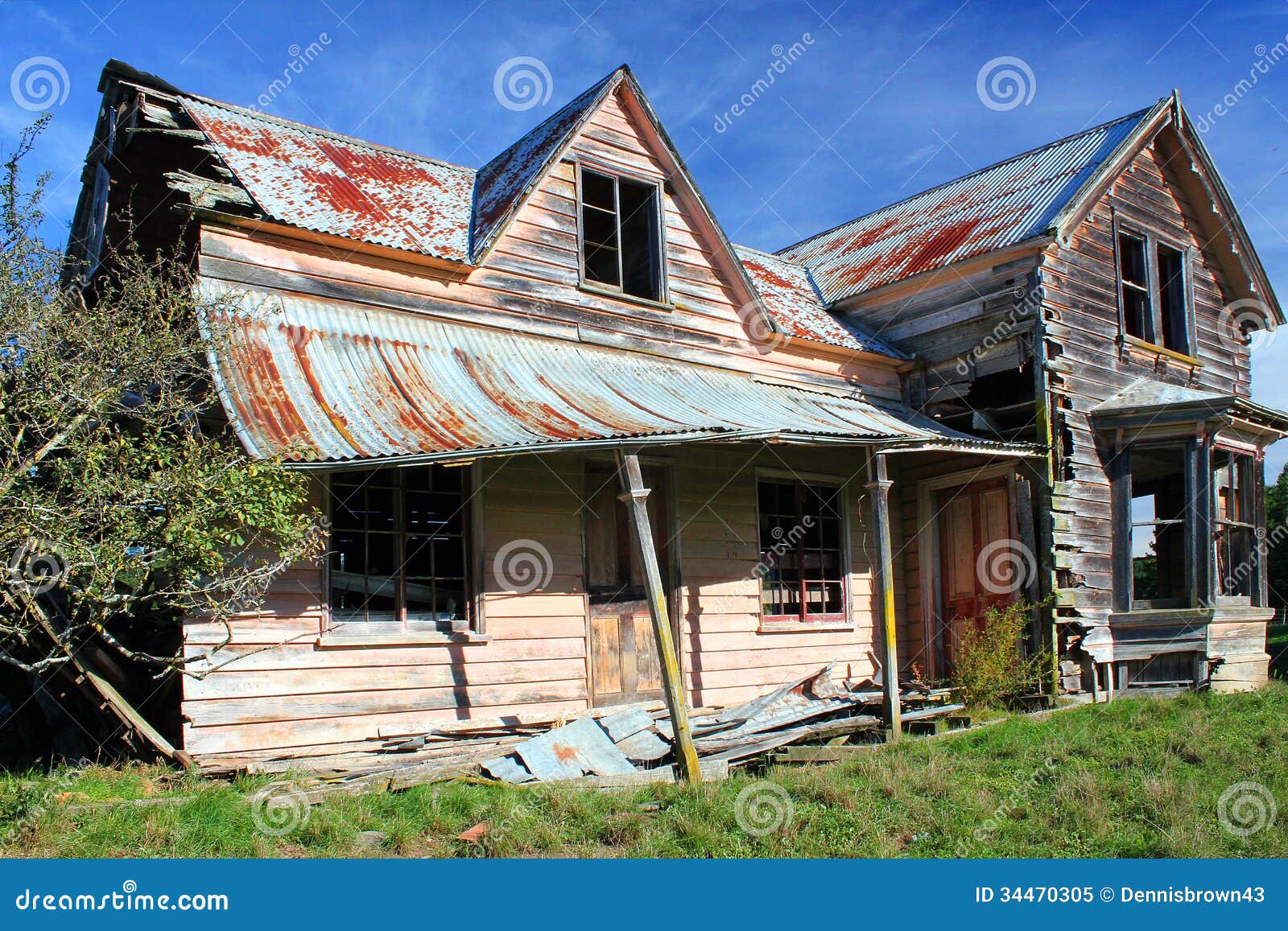 derelict-house-old-wood-corrugated-iron-poor-condition-rusted-falling-down-situated-rural-area-34470305.jpg