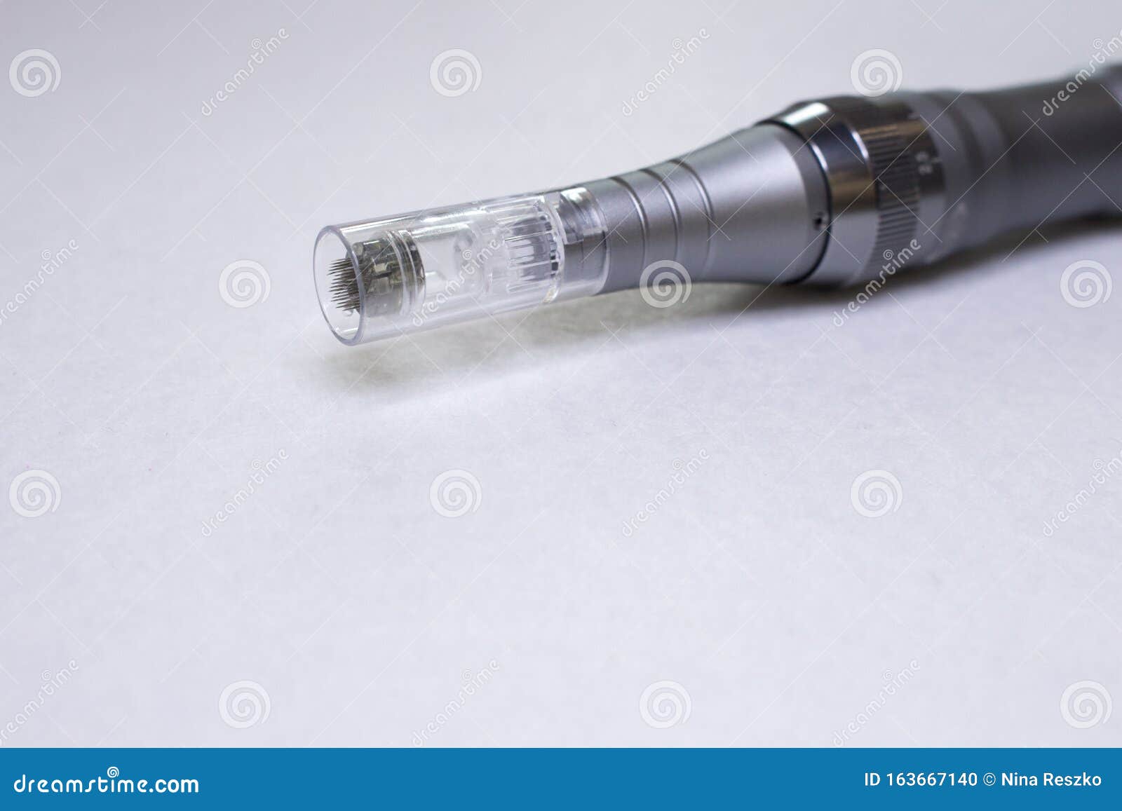 dermis stamp electric pen. dermapen. needle mesotherapy treatment.