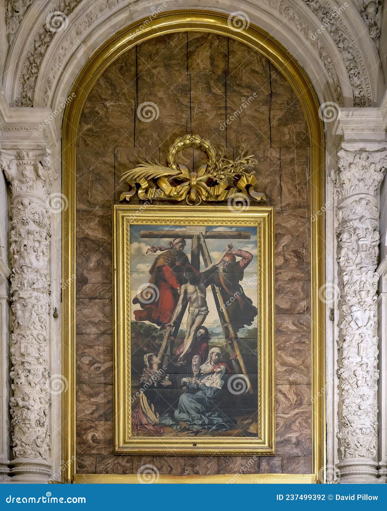 `descent from the cross` by pedro de campana in the main sacristy of the seville cathedral in spain.