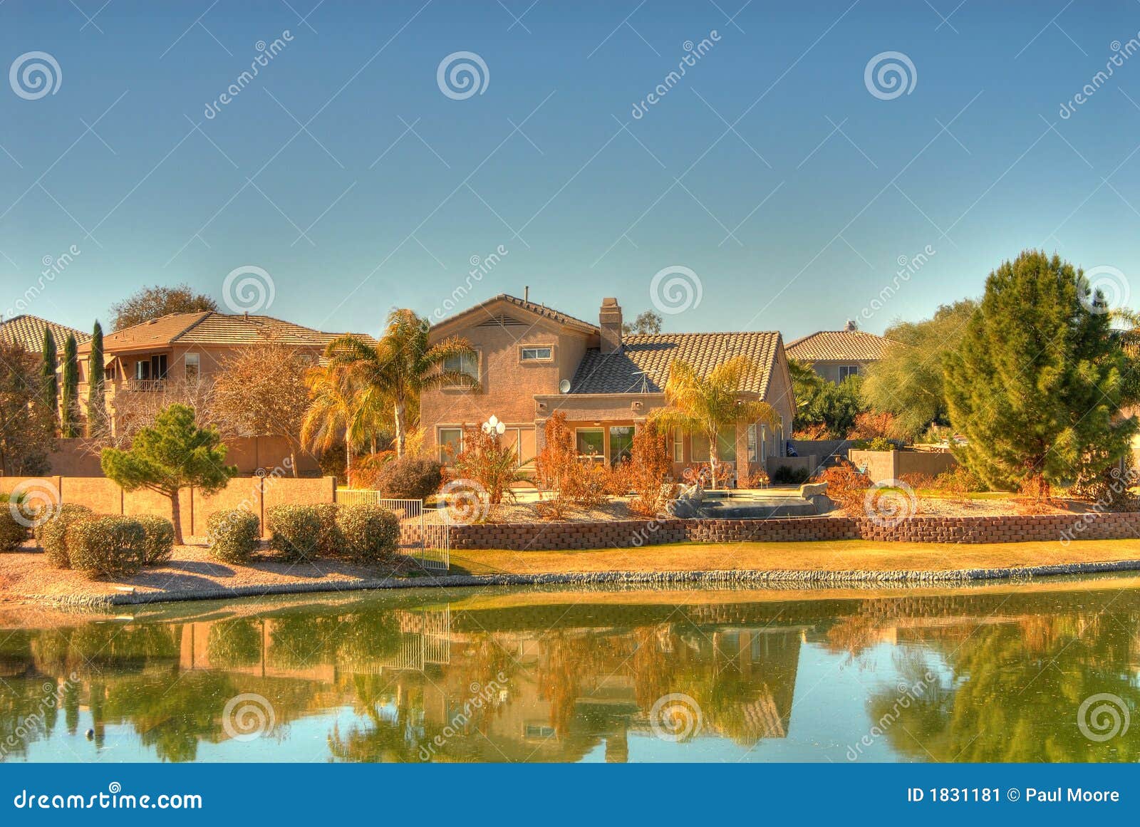 Desert Lake Homes stock image. Image of poolside, hills 1831181