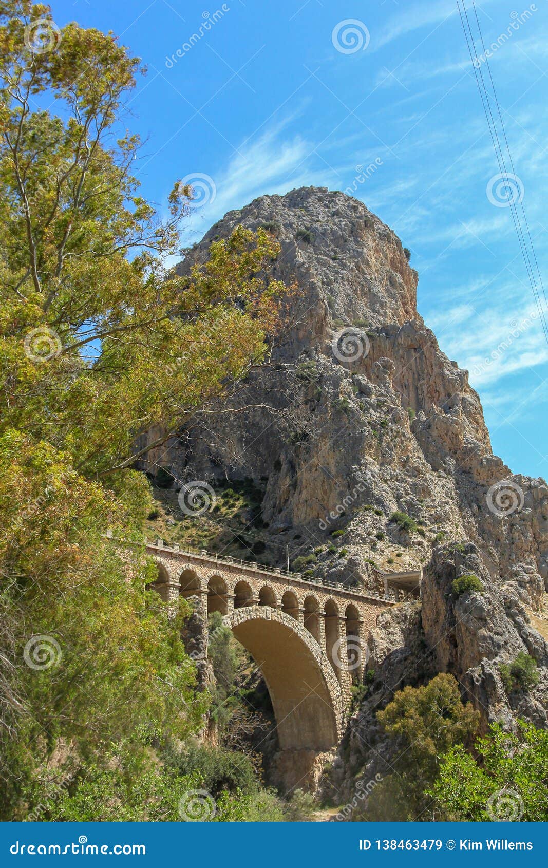 mountain view with a stone bridge in the malaga province