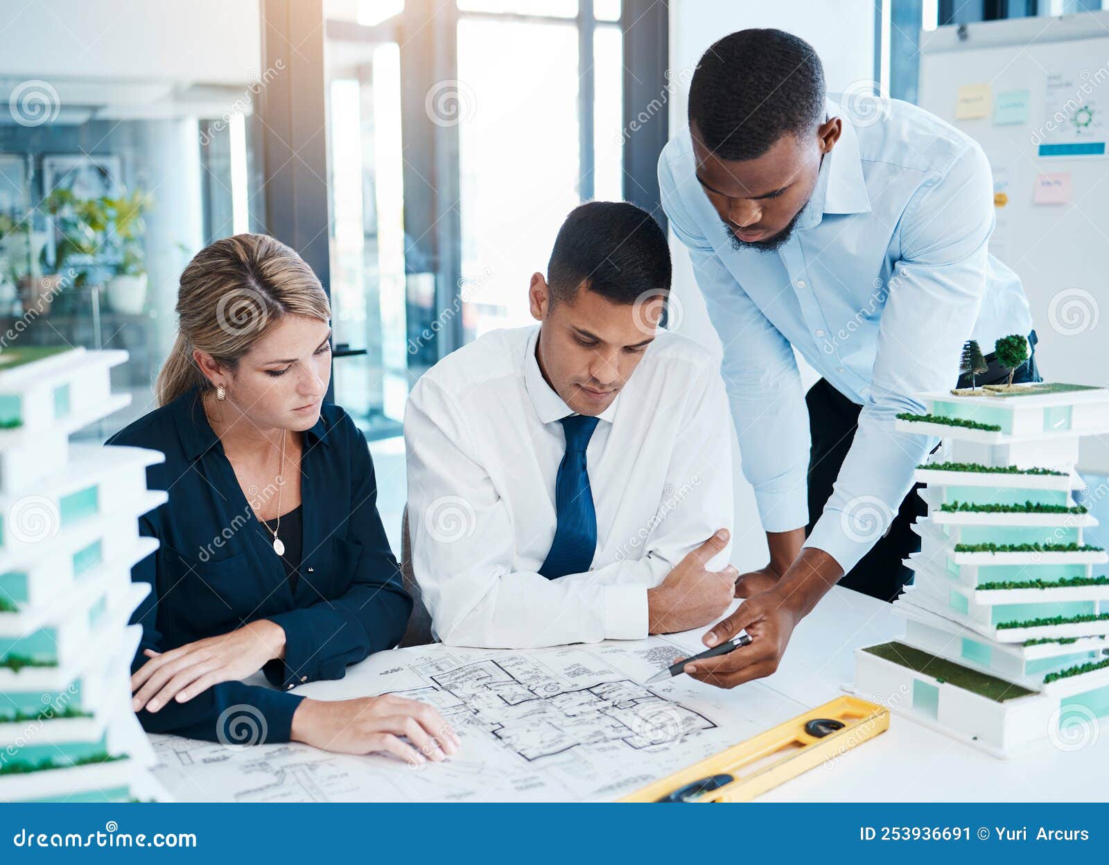 Designers and Architects Working on Construction Plan, Planning with Blueprint Paperwork and