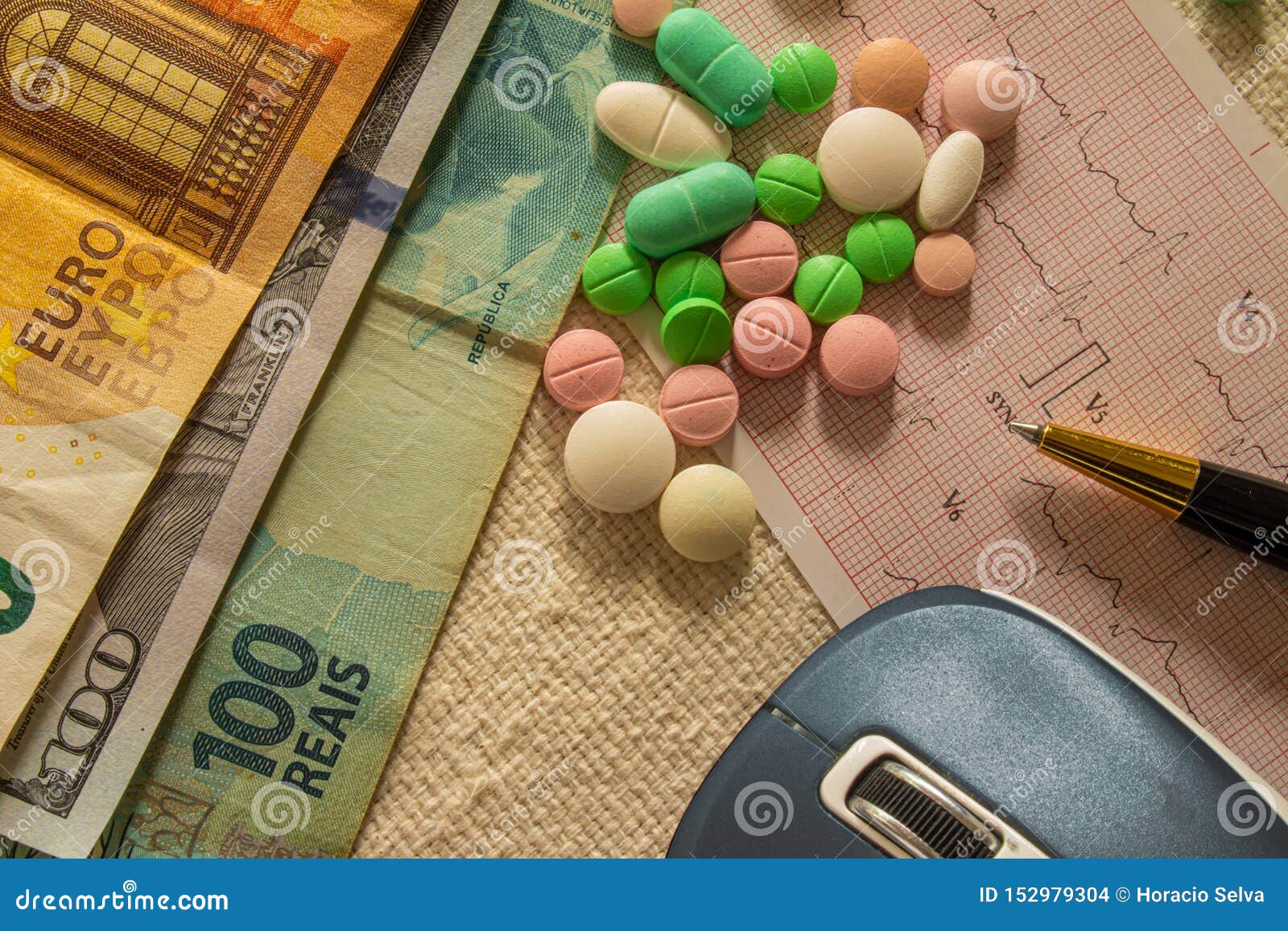 Desk With Bills And Medicines Concept Of Cost Of Health And Drug