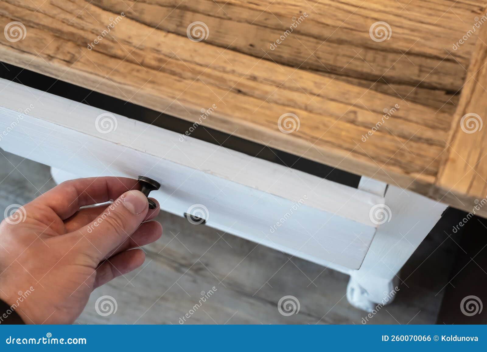 desk drawer that opens with a hand. flatley.