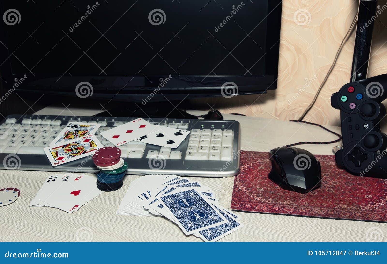 Desk Of The Player In Online Casinos With Scattered Cards And Po