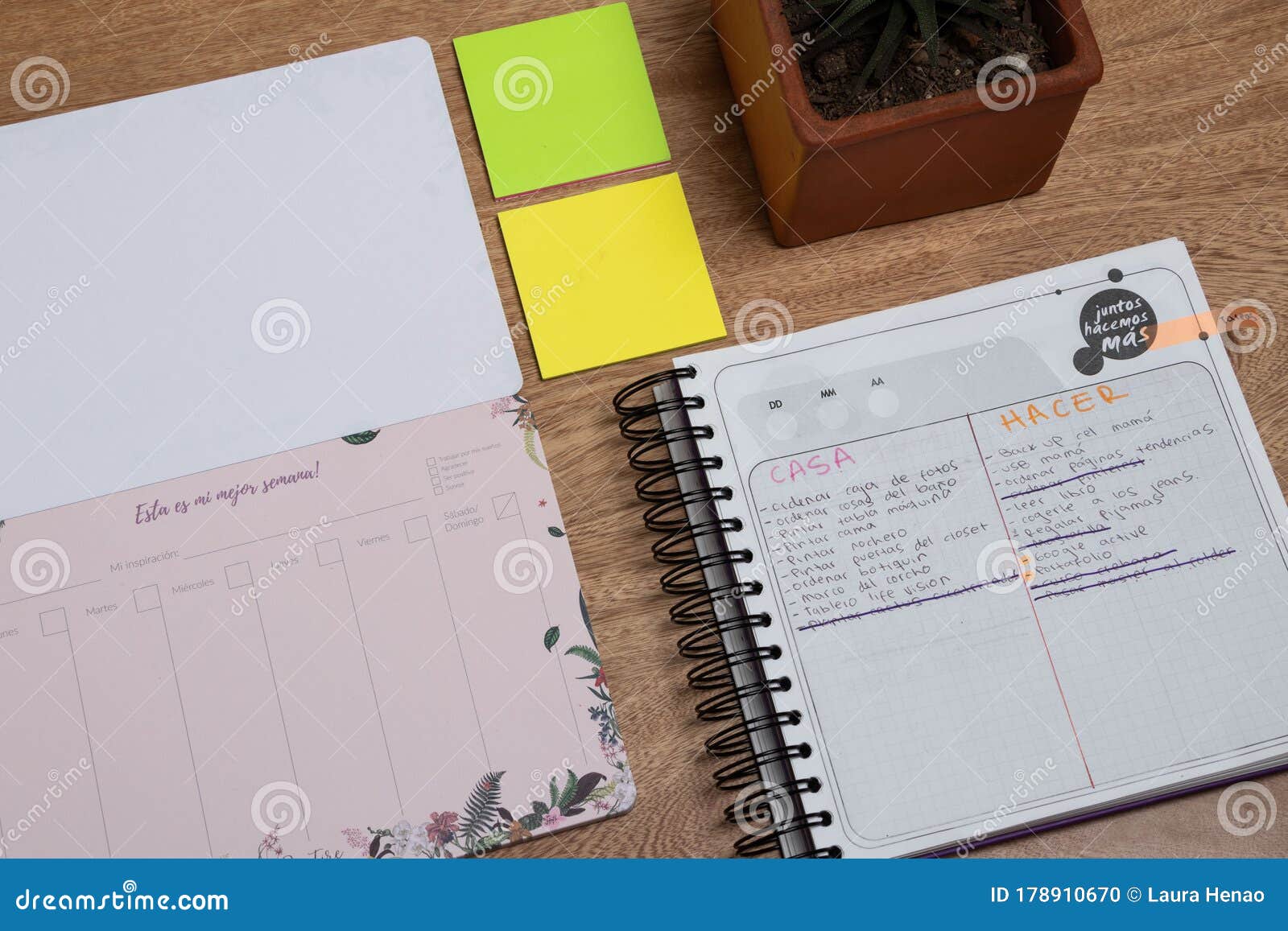 Desk with Stationery and List of Things To Do with Spanish Text Stock