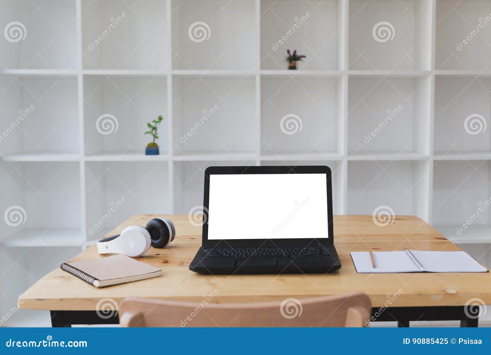 Desk Table With Laptop Headphone Notepad With White Bookshelf