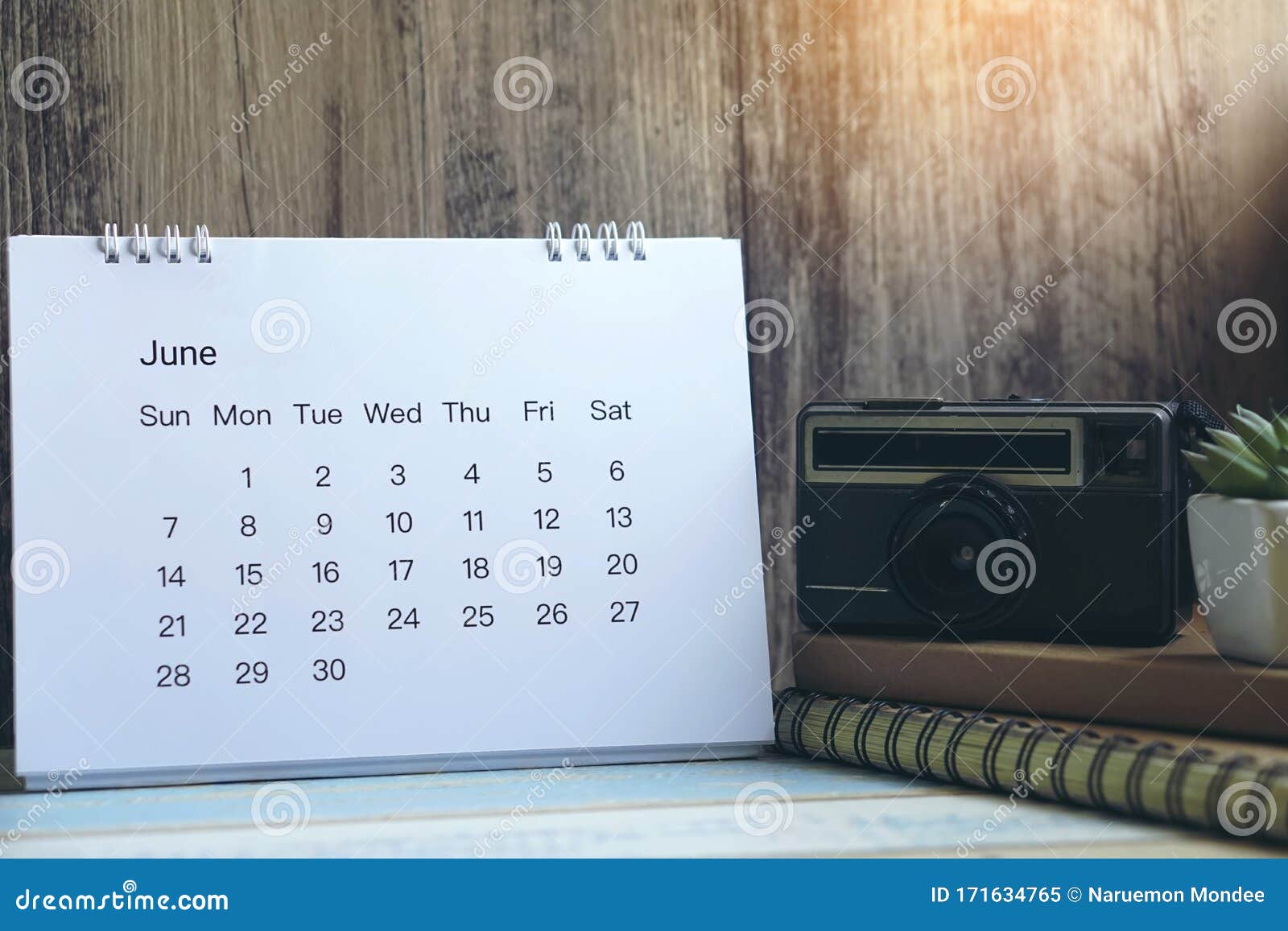desktop calendar vintage camera and diary for planner