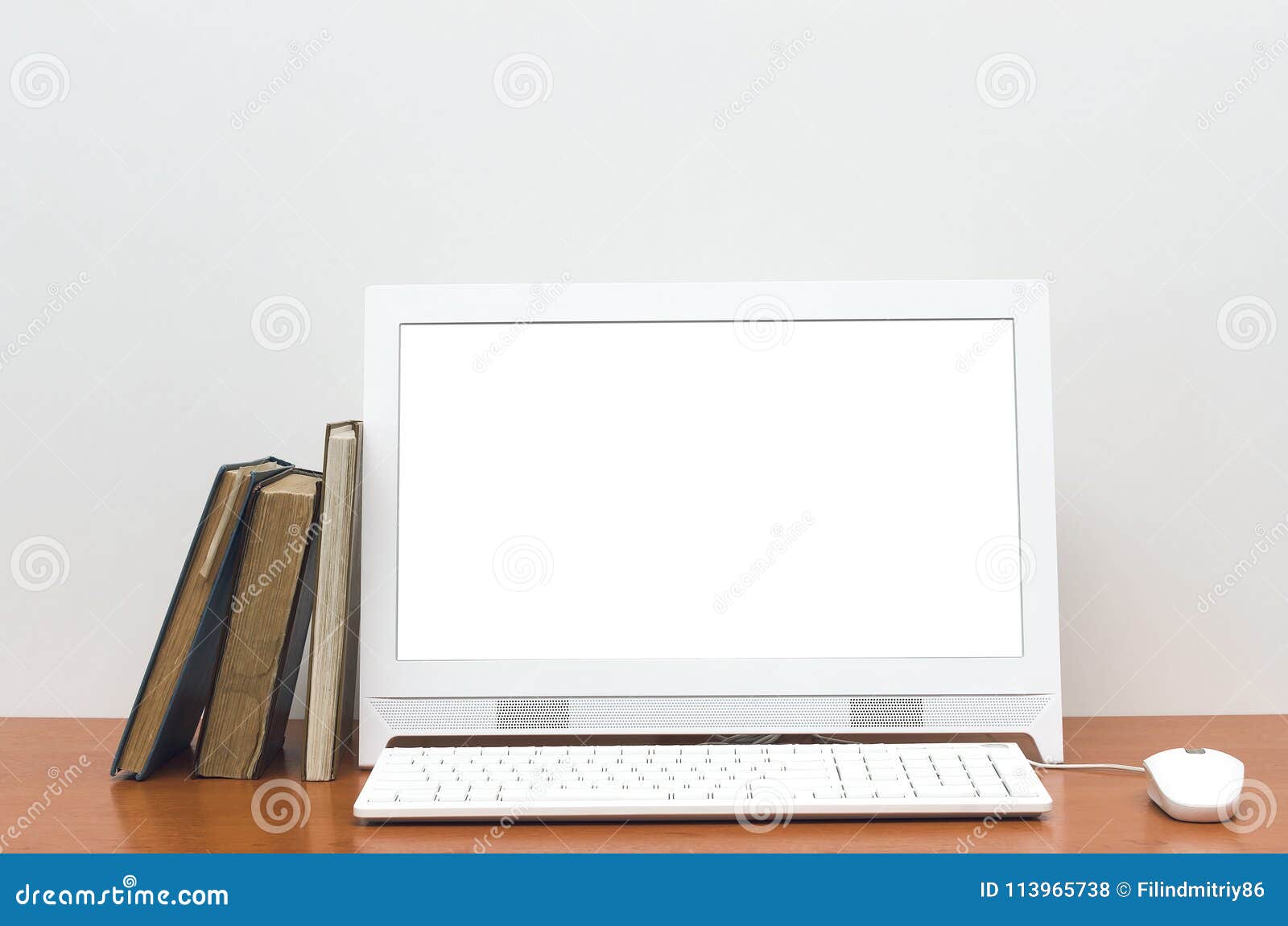 Desktop Computer With Blank White Screen On The Desk Table Stock