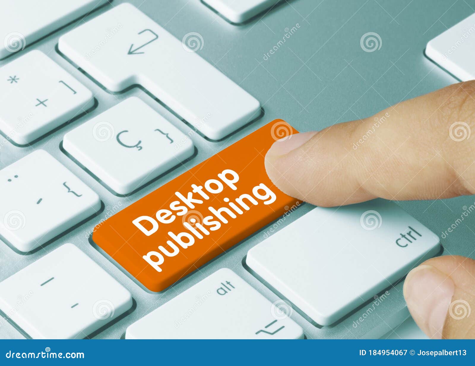 desktop publishing - inscription on orange keyboard key