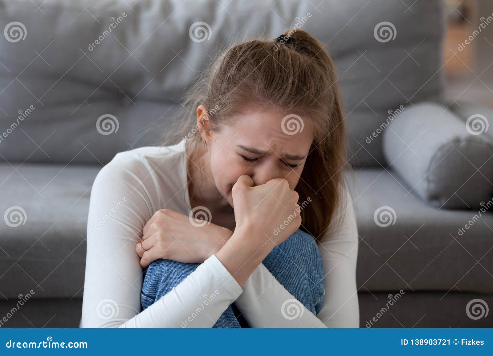 Desperate Upset Teen Girl Victim Crying Alone At Home Stock Image