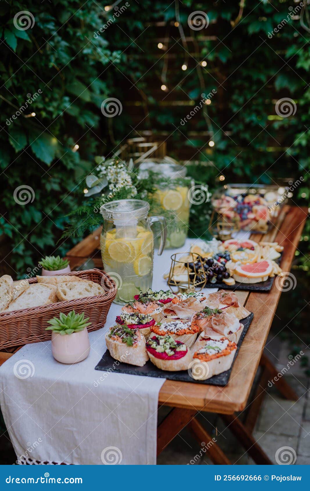 dessert buffet at small wedding reception outside in the backyard.