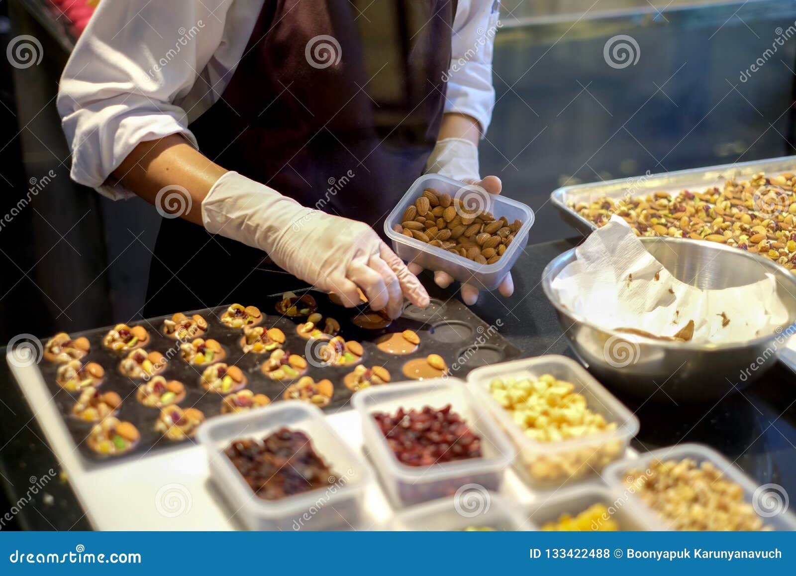 Dessert Chef Preparing Milk Chocolate and Almond Appetizer Stock Photo