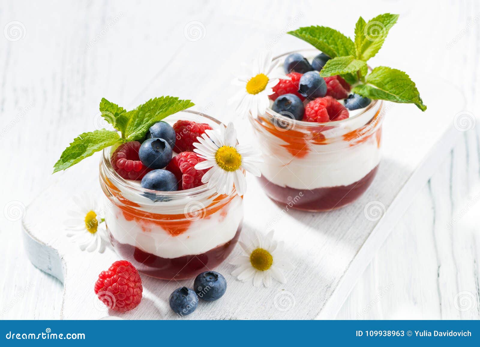 Dessert with Jam, Cream and Fresh Fruit in a Glass Jars Stock Image