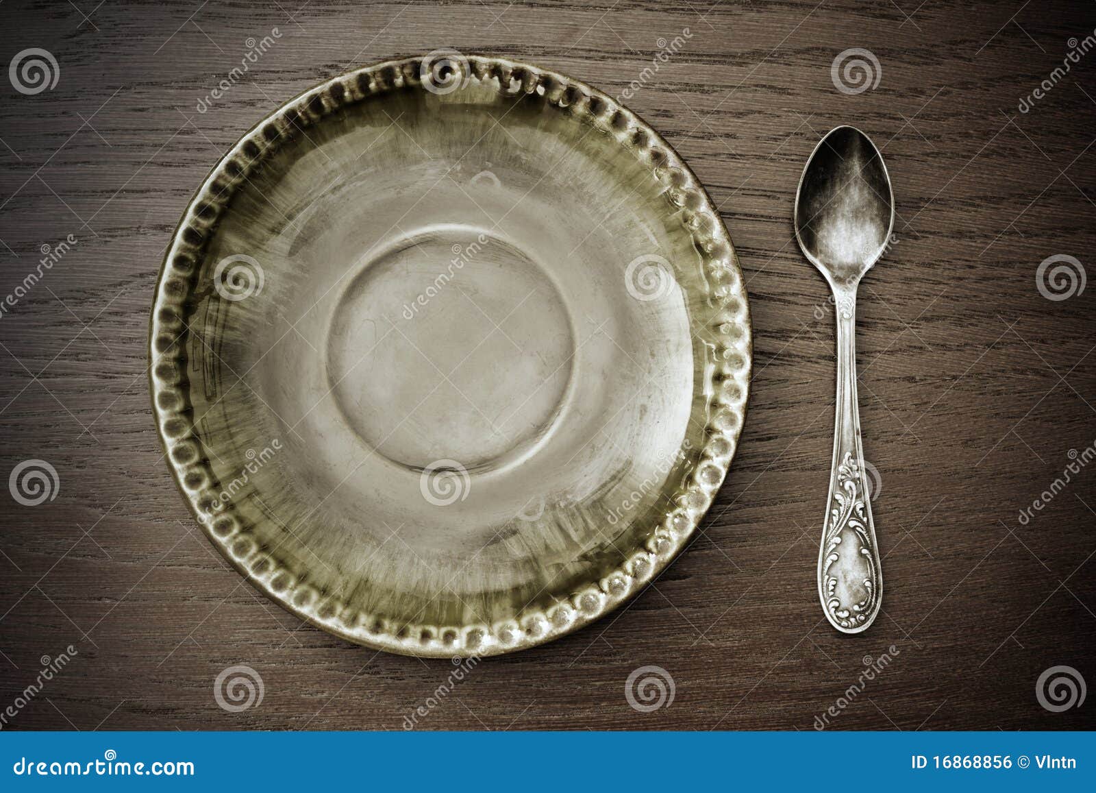 Dessert plate and spoon stock photo. Image of dining 16868856