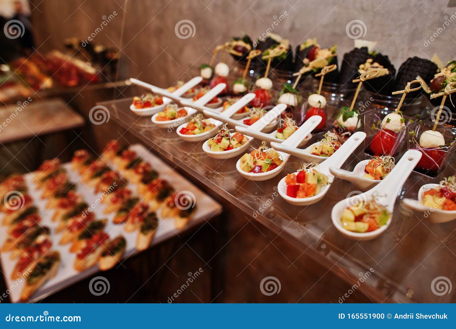Dessert Table of Delicious Snacks on Wedding Reception Stock Photo