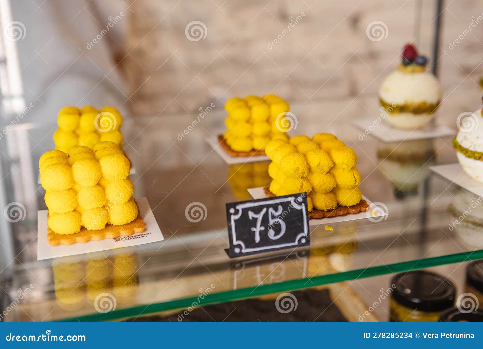Desserts on Counter at Bakery. Stock Photo Image of desserts, window