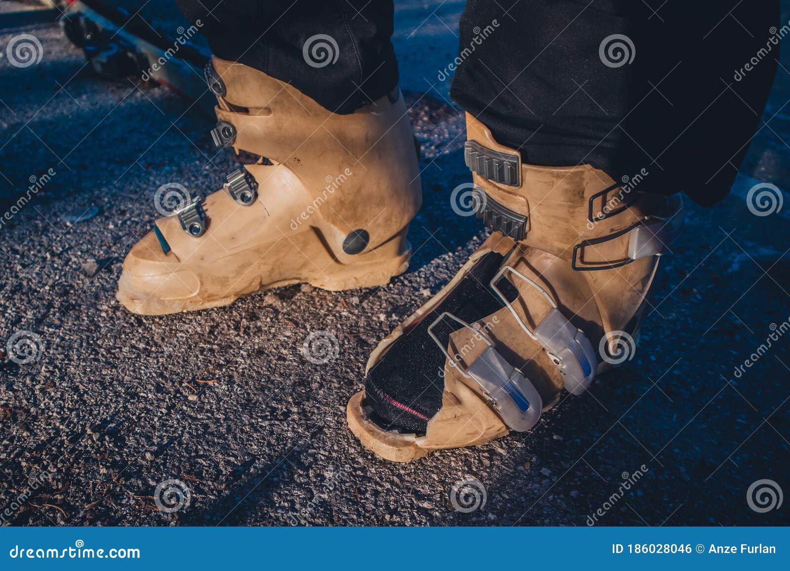 Destroyed Old Ski Boot with a Hole Inside. Old Plastic Being Ripped