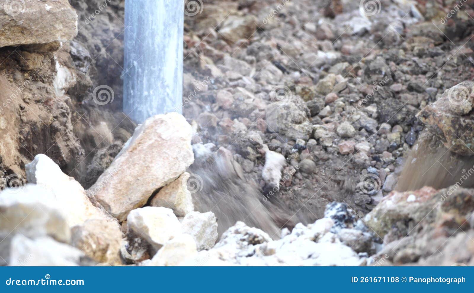 Loud Destruction of Solid Soil Rock with Pneumatic Jackhammer Excavator