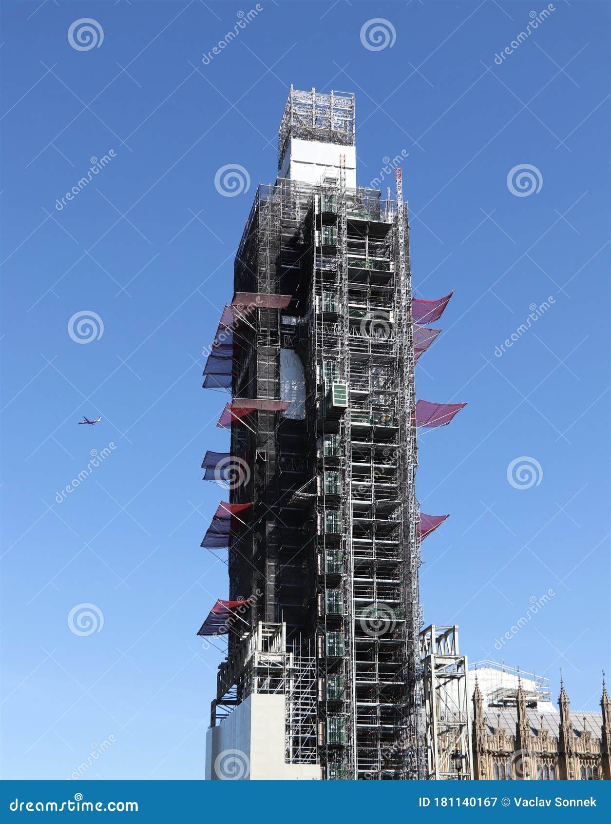 detail on big ben, part of westminster palace, who is under reconstruction. tourists must wait for this magnificent landmark of